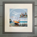 The Dry Season by Gary Walton Limited Edition Print, whimsical seaside print of a boat next to a crooked legged pier with colourful houses 