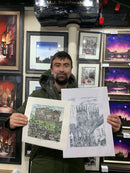 Artist Shaun Wyatt with his linocut prints.