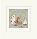 Mounted artwork with three dogs around a cake on a textured background