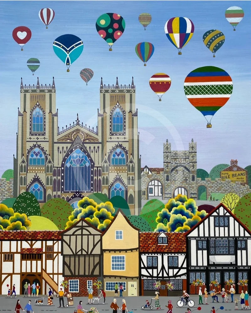 York Balloon Fiesta contemporary colourful art print by Linda Mellin. York Minster with hot air balloons, portrait shaped cityscape. 