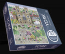 A boxed jigsaw puzzle package titled YORK, shown at an angle against a dark background. The front and side panels feature a colorful illustrated scene of a historic cathedral and town with people, trees, and buildings.